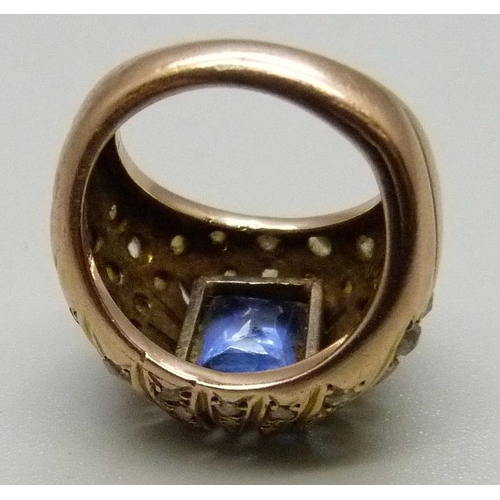 969 - A yellow metal, diamond and blue stone ring, 8g, G, (the stone tests as blue topaz, the metal tests ... 