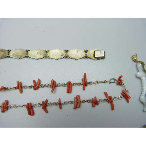 999 - A silver and guilloche enamel bracelet, a coral necklace, one other necklace, etc.