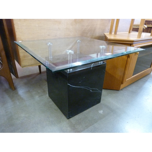 1340 - A Italian style black marble and glass topped coffee table