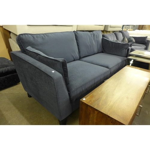 1390 - An ink blue upholstered 3.5 seater sofa