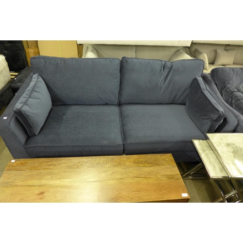 1390 - An ink blue upholstered 3.5 seater sofa