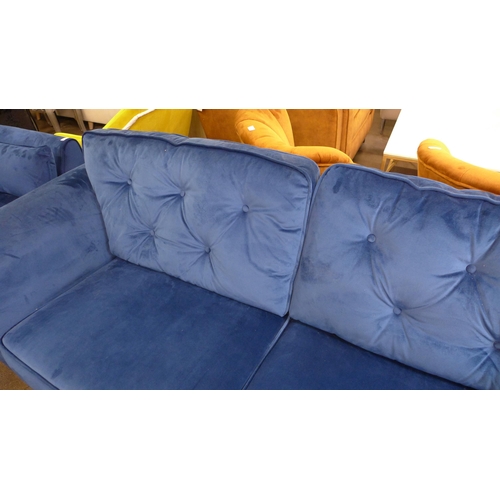 1554 - A pair of blue Hoxton velvet three seater sofas and a two seater sofa