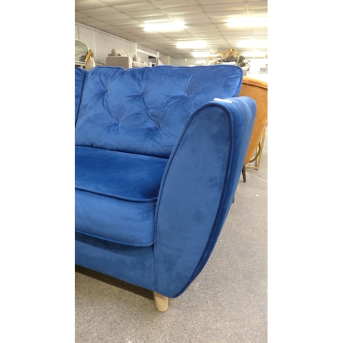 1554 - A pair of blue Hoxton velvet three seater sofas and a two seater sofa