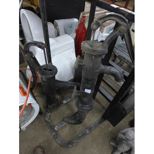 2126 - Two vintage/antique water pumps, 1 recently used as water feature, heavy cast iron items, possibly a... 