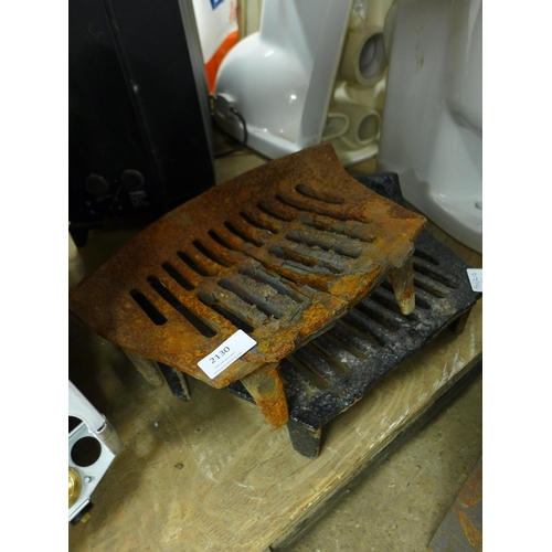 2130 - 2 Cast metal dog grates/open fire grates