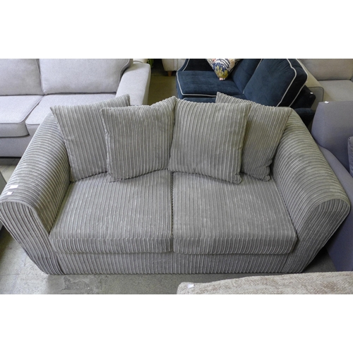 1596 - A grey jumbo corduroy 2.5 seater sofa bed