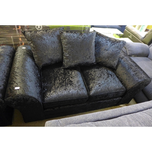 1612 - A black velvet pair of two seater sofas