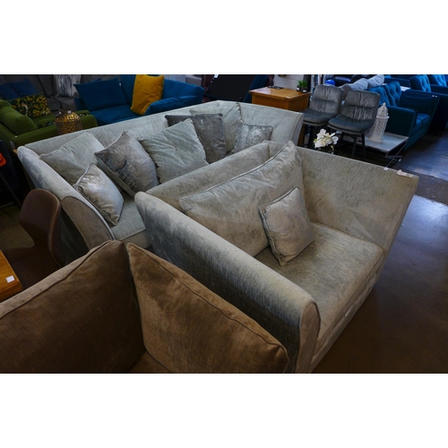 1301 - An Aria silver upholstered four seater sofa and love seat