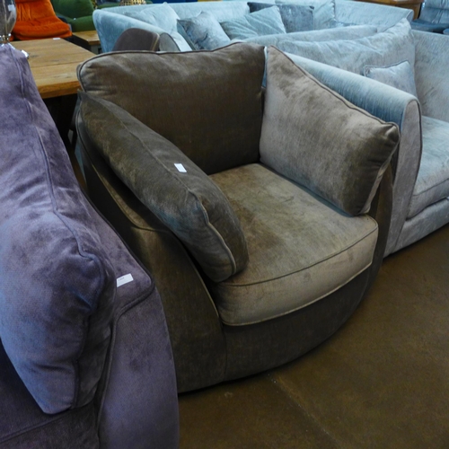 1302 - A Dolce mink upholstered swivel loveseat