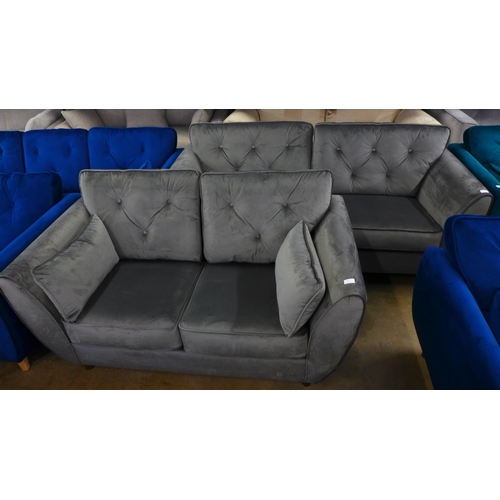 1485 - An ash grey velvet three and two seater sofa