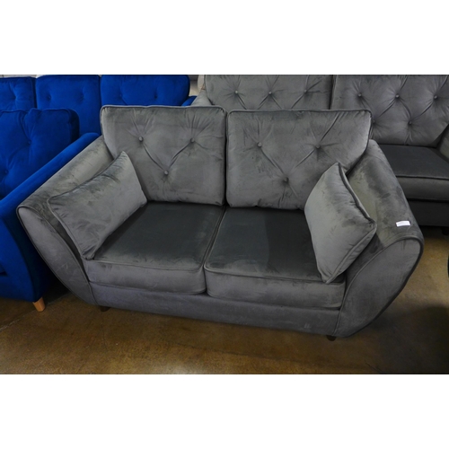 1485 - An ash grey velvet three and two seater sofa