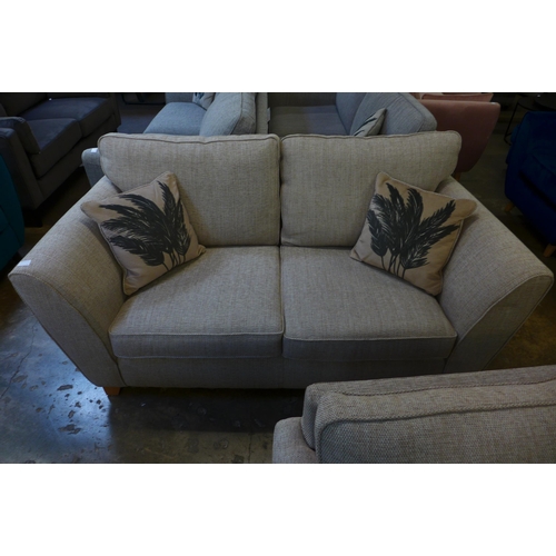 1490 - An oatmeal upholstered 2.5 seater sofa and armchair