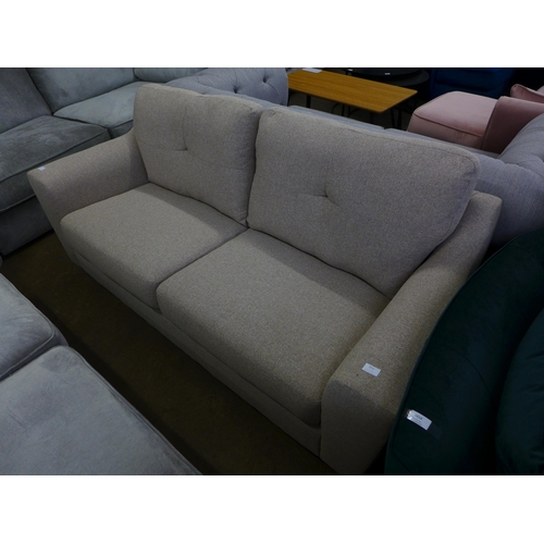 1536 - An oatmeal upholstered 2.5 seater sofa