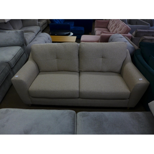 1536 - An oatmeal upholstered 2.5 seater sofa