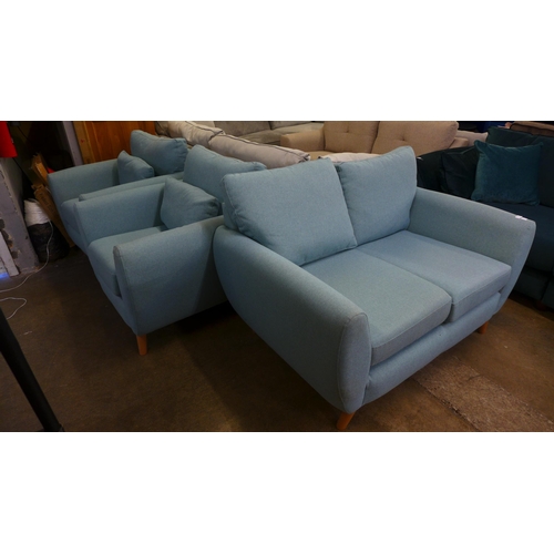 1553 - A baby blue upholstered two seater sofa with a pair of armchairs - slight marks