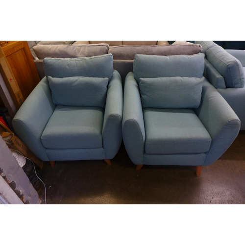 1553 - A baby blue upholstered two seater sofa with a pair of armchairs - slight marks