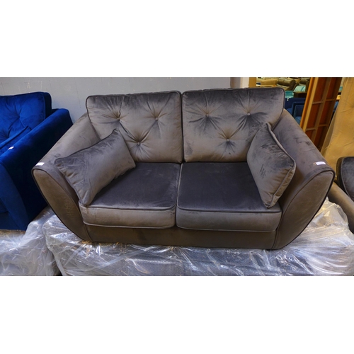 1568 - An ash grey velvet three seater, two seater and armchair