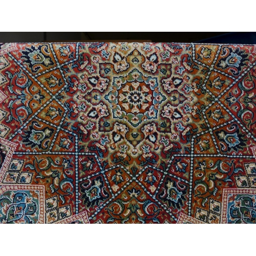 1572 - A blue ground Royal Palace rug, central medallion design, 170cm x 120cm