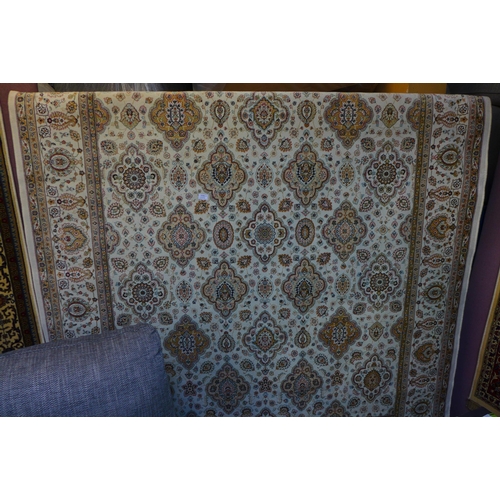 1576 - A cream ground all over floral patterned carpet, 200cm x 300cm