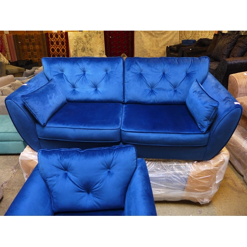 1607 - A pair of deep ocean blue velvet three seater sofa and armchair