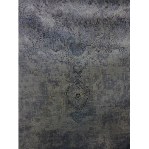 1610 - An ivory and grey ground contemporary vintage style carpet, 200cm x 300cm