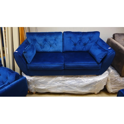 1615 - A pair of deep ocean blue velvet three seater sofas