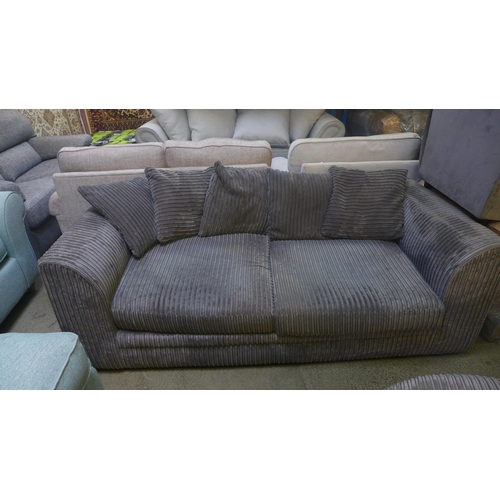 1571 - A grey jumbo corduroy three seater sofa and swivel love seat