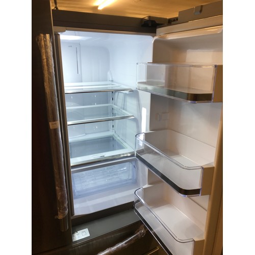 2170 - Samsung brushed steel American-style fridge/freezer with drinks dispenser. We have powered on in the... 