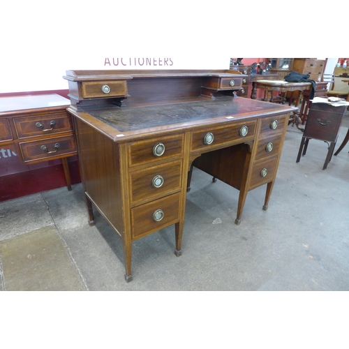 116 - A late Victorian Warings inlaid mahogany desk