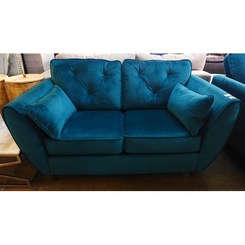 1484 - A teal velvet two seater sofa