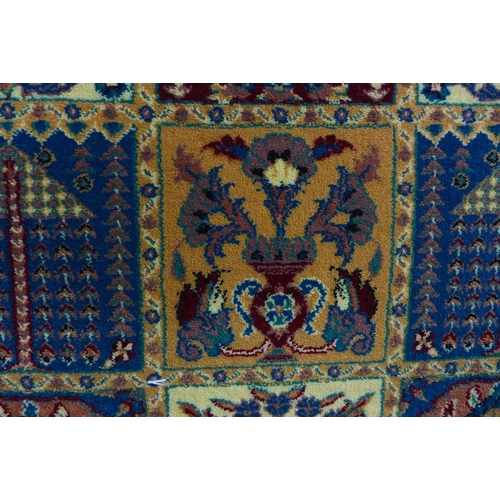 1599 - A fine woven duck egg blue ground rug with Persian panel design