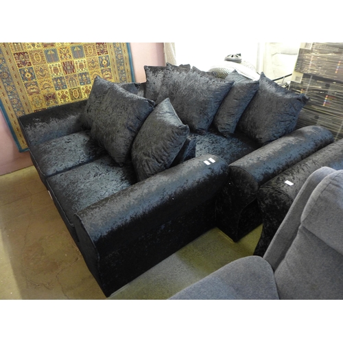 1628 - A black velvet two and three seater sofa