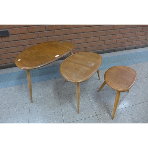 1 - An Ercol Blonde elm and beech pebble shaped nest of tables