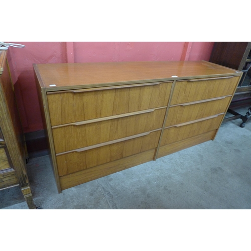 10 - A teak chest of drawers