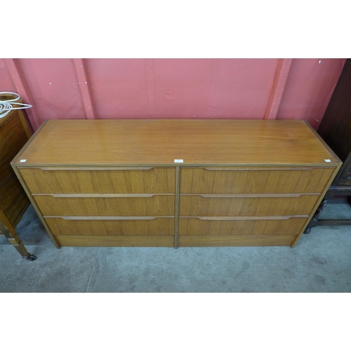 10 - A teak chest of drawers