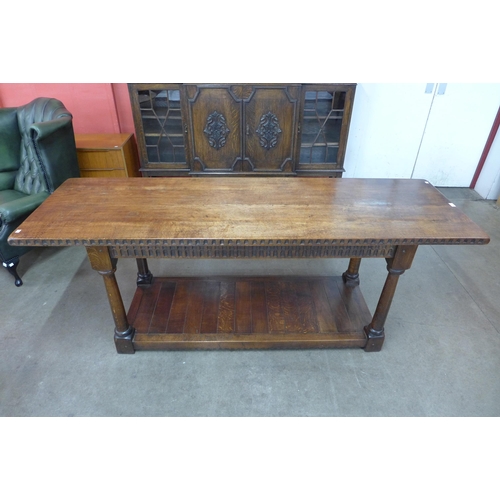 100 - A 17th Century style oak refectory table