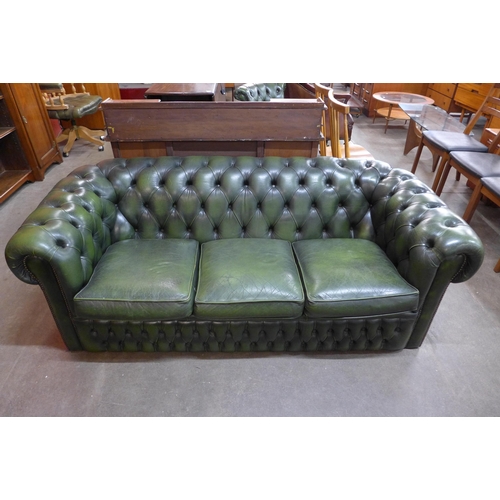 115A - A green leather Chesterfield settee