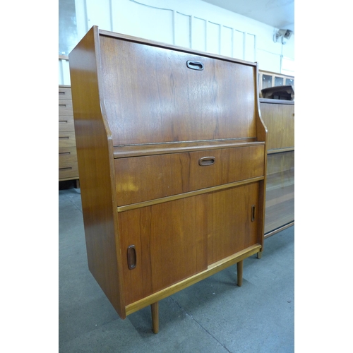 12 - A teak bureau