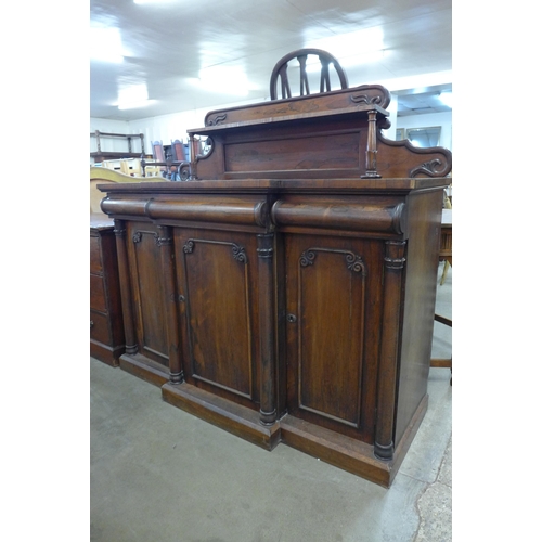 122 - A William IV rosewood breakfront three door sideboard