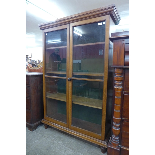 125 - A Victorian oak two door bookcase