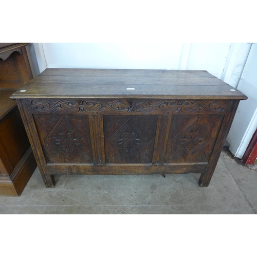 133 - A William III carved oak coffer