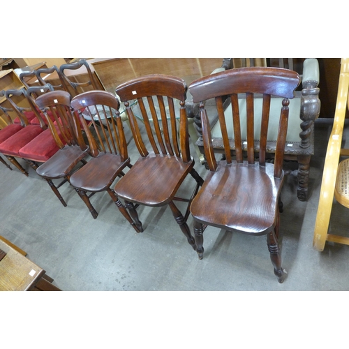 138 - A set of four Victorian elm and been kitchen chairs