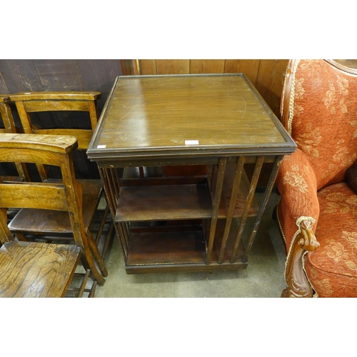 146 - An Edward VII mahogany revolving bookcase