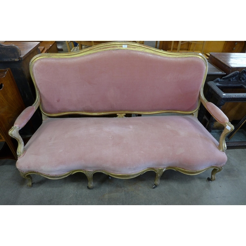 158 - A 19th Century French giltwood and pink fabric upholstered settee