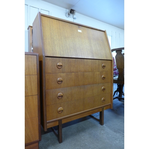 16 - A teak bureau