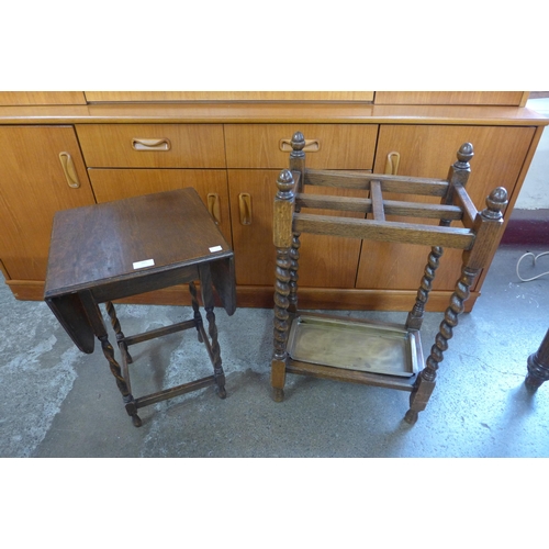 161 - An oak barleytwist stick stand and a small oak barleytwist drop leaf occasional table