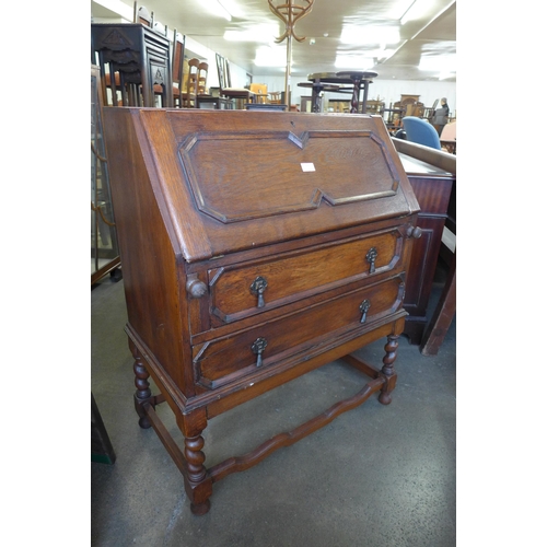 169 - An oak barleytwist bureau