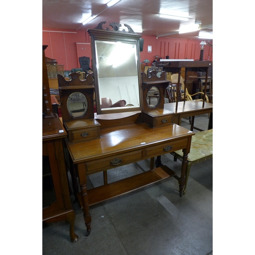 194 - A Victorian walnut dressing table