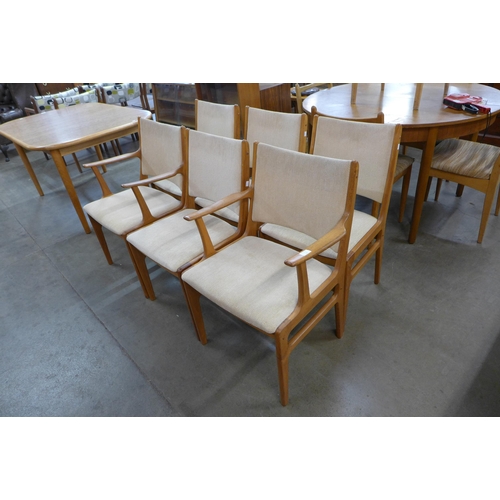 23 - A set of six Danish teak dining chairs