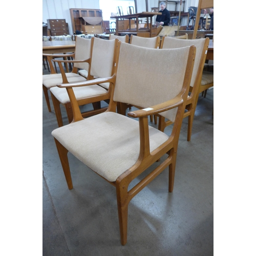 23 - A set of six Danish teak dining chairs